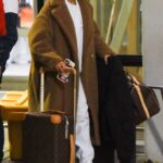 Molly-Mae Hague in a Caramel Coloured Faux Fur Coat Arrives at JFK Airport in New York 12/30/2021