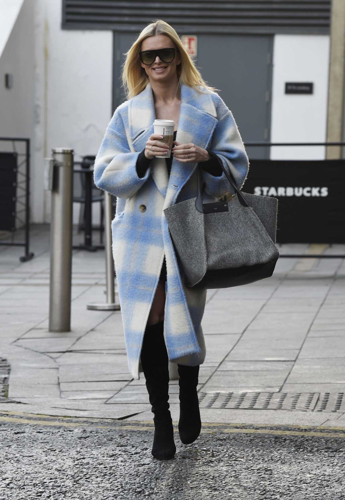 Nadiya Bychkova in a Plaid Coat