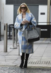 Nadiya Bychkova in a Plaid Coat