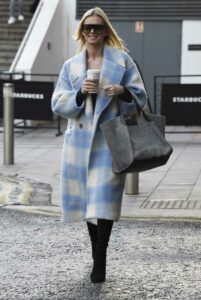 Nadiya Bychkova in a Plaid Coat