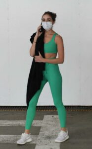 Olivia Culpo in a Green Workout Ensemble