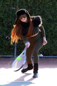 Phoebe Price in a Black Beanie Hat