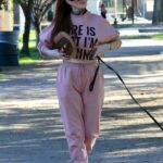 Phoebe Price in a Lilac Sweatpants Walks Her Dog at the Park in Los Angeles 01/28/2022