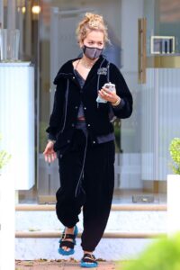 Rita Ora in a Black Velvet Tracksuit