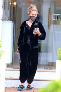 Rita Ora in a Black Velvet Tracksuit