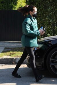 Zoey Deutch in a Turquoise Coloured Puffer Jacket