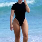 Bianca Elouise in a Black Swimsuit on the Beach in Miami 02/17/2022