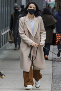 Camila Mendes in a Beige Coat