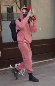Cara Delevingne in a Pink Sweatsuit