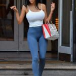 Chloe Khan in a White Top Arrives at the Neighbourhood Restaurant in Liverpool 02/10/2022