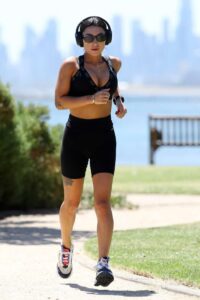 Ella May Ding in a Black Sports Bra