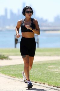 Ella May Ding in a Black Sports Bra