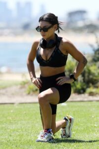 Ella May Ding in a Black Sports Bra