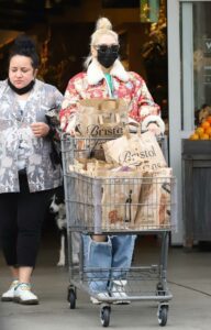 Gwen Stefani in a Red Floral Print Jacket