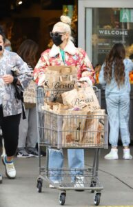 Gwen Stefani in a Red Floral Print Jacket