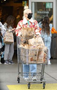 Gwen Stefani in a Red Floral Print Jacket