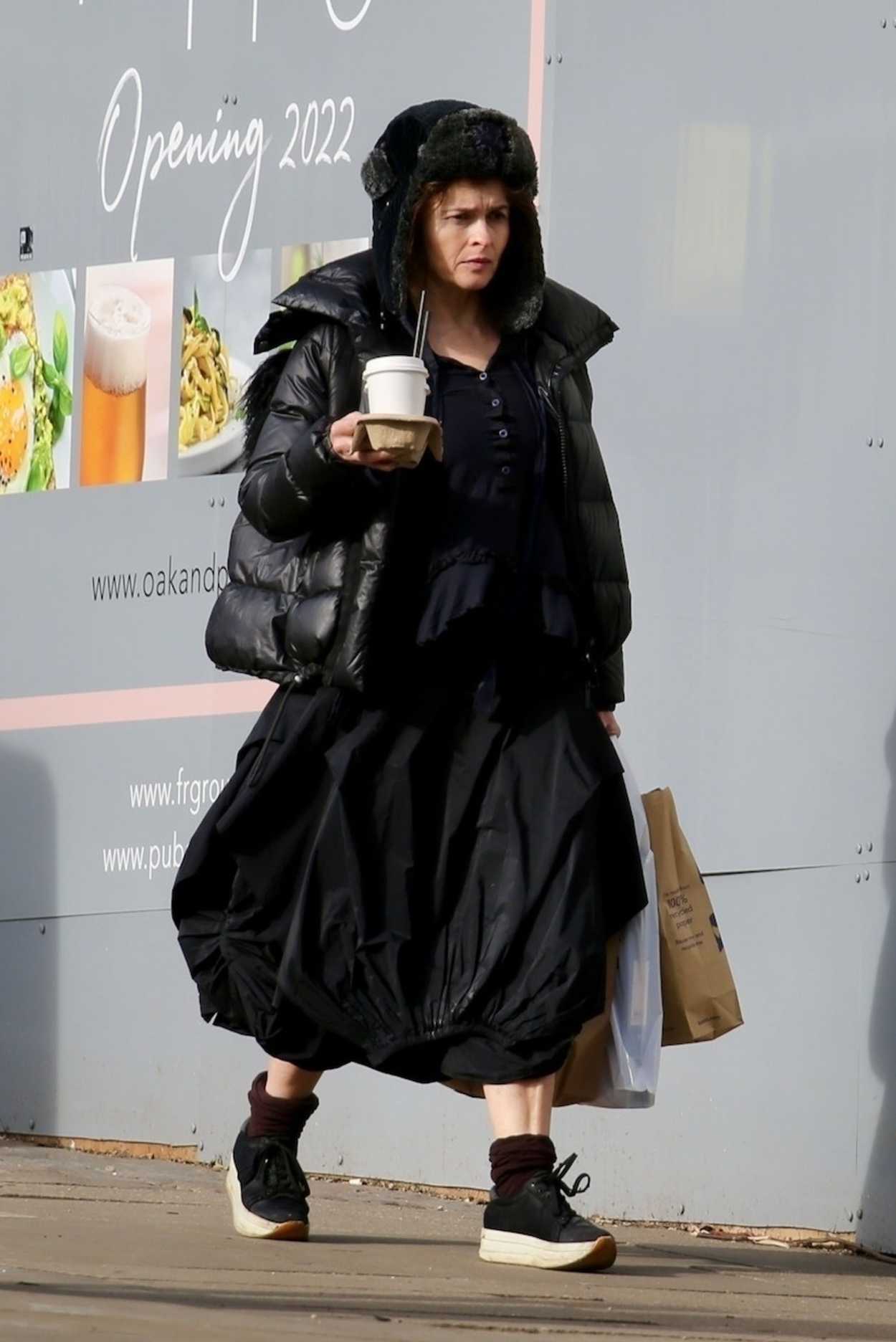 Helena Bonham Carter in a Black Puffer Jacket