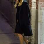 Jennifer Coolidge in a Black Trench Coat Leaves the Set of Jimmy Kimmel Live in Los Angeles 02/07/2022