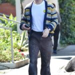 Joe Jonas in a Striped Cardigan Was Seen Out in Los Feliz 02/20/2022