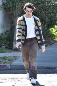 Joe Jonas in a Striped Cardigan