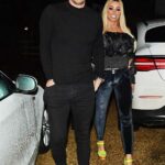 Katie Price in a Black Blouse Was Seen Out with Her Beau Carl Woods in London 02/15/2022