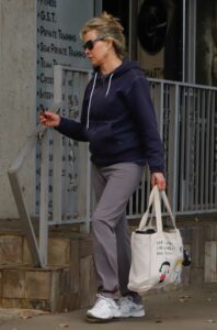 Kim Basinger in a White Sneakers