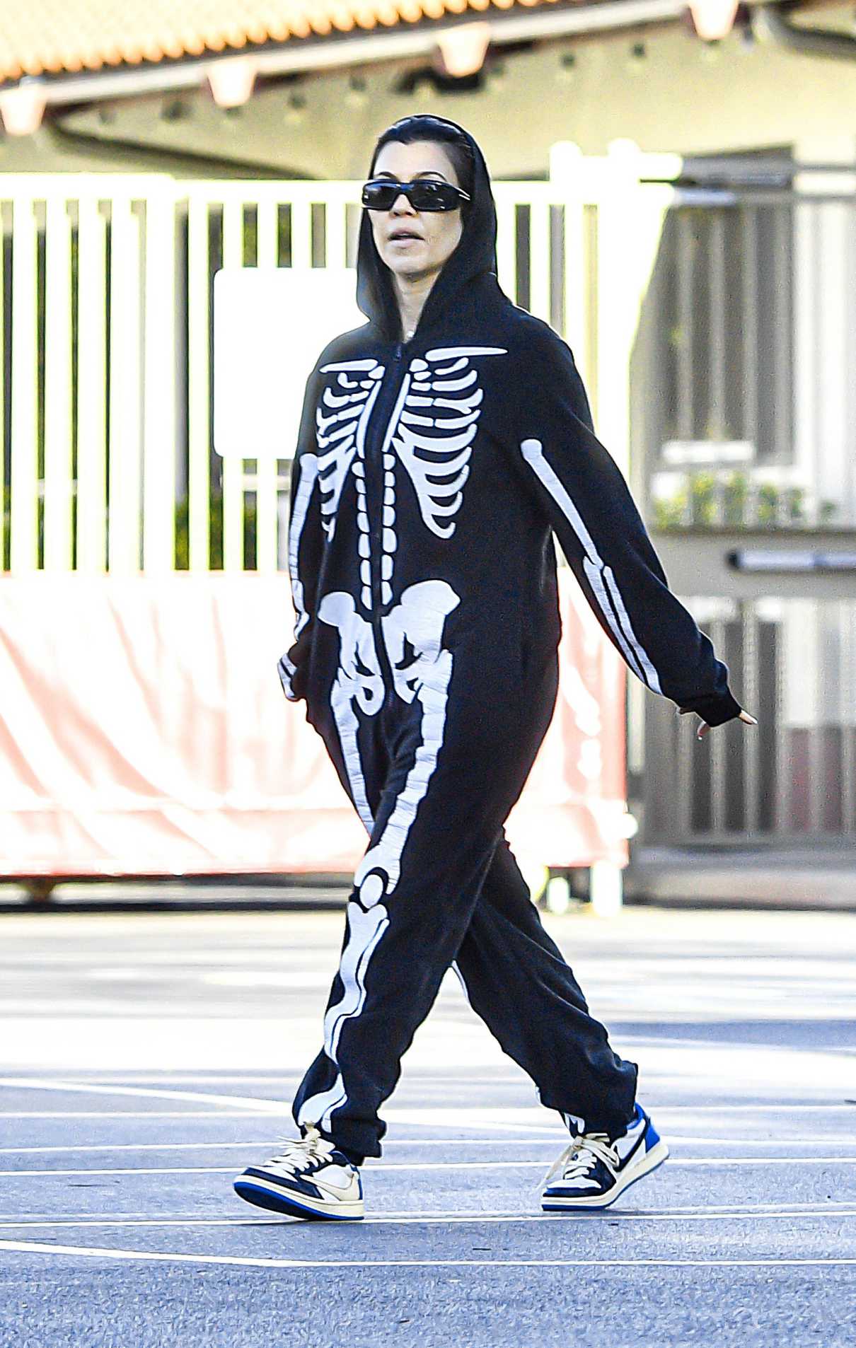 Kourtney Kardashian in a Skeleton Print Playsuit