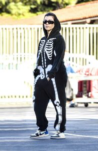 Kourtney Kardashian in a Skeleton Print Playsuit