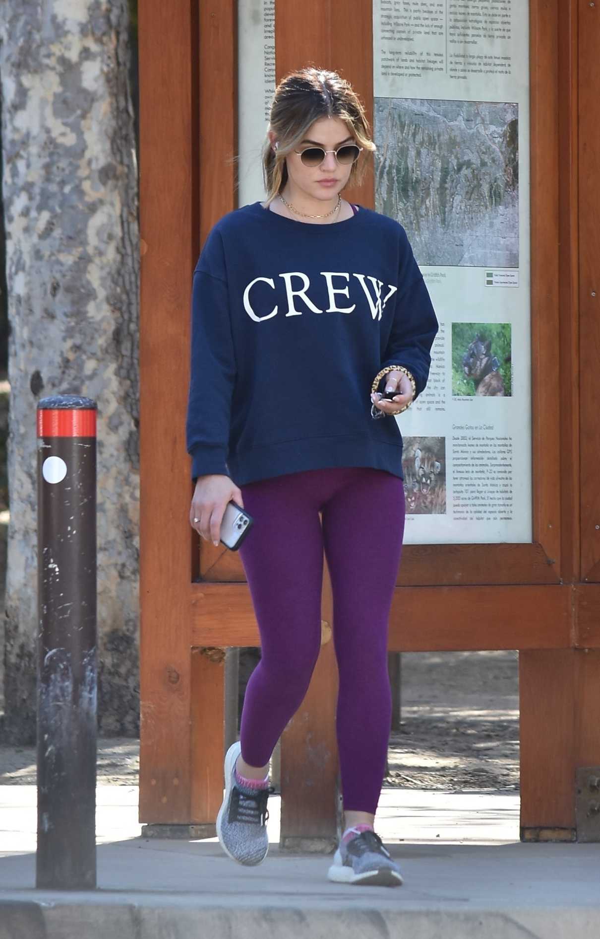 Lucy Hale in a Purple Leggings