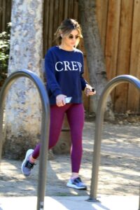 Lucy Hale in a Purple Leggings