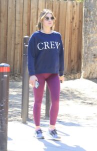 Lucy Hale in a Purple Leggings