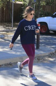 Lucy Hale in a Purple Leggings