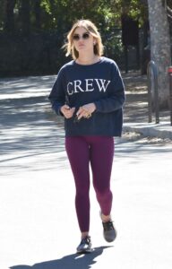 Lucy Hale in a Purple Leggings