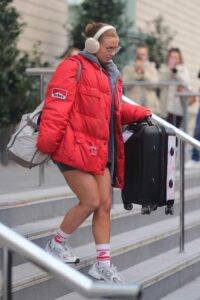 Maisie Smith in a Red Puffer Jacket