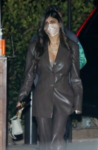 Mia Khalifa in a Brown Leather Pantsuit