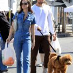 Natalie Joy in a Denim Jumpsuit Goes Shopping at the Farmers Market Out with Nick Viall in Los Angeles 02/20/2022