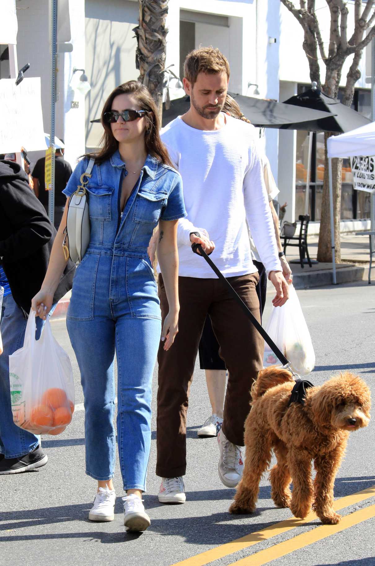 Natalie Joy in a Denim Jumpsuit