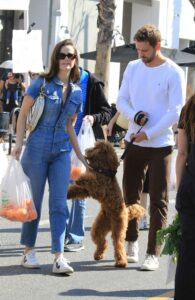 Natalie Joy in a Denim Jumpsuit