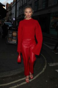 Roxy Horner in a Red Outfit