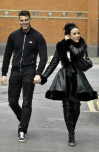 Stephanie Davis in a Black Leather Coat