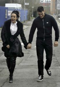 Stephanie Davis in a Black Leather Coat