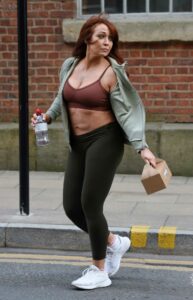 Amy Anzel in an Olive Leggings