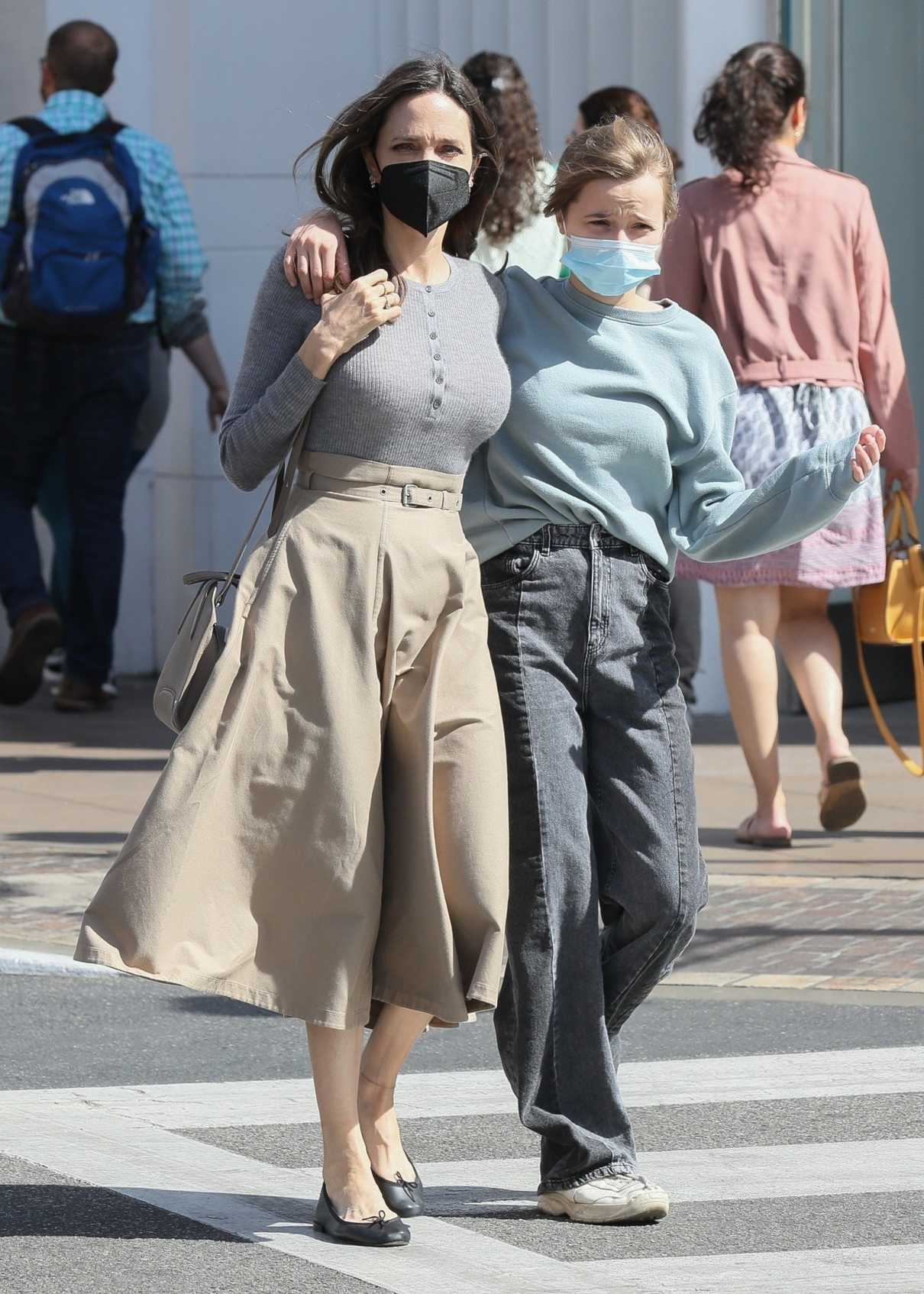 Angelina Jolie in a Beige Skirt