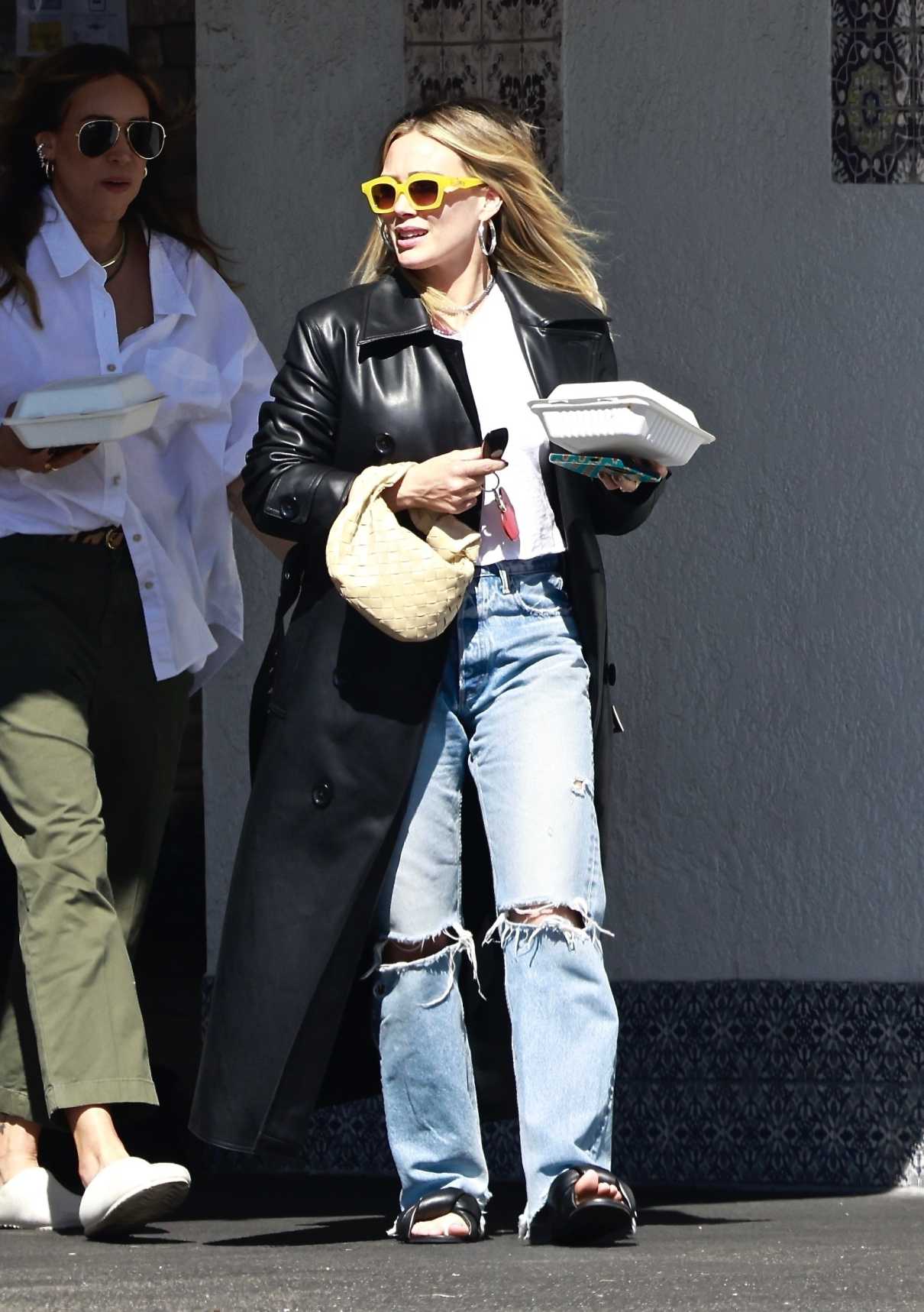 Hilary Duff in a Black Leather Coat