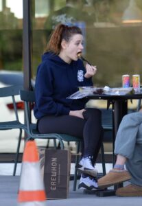 Joey King in a Blue Hoodie