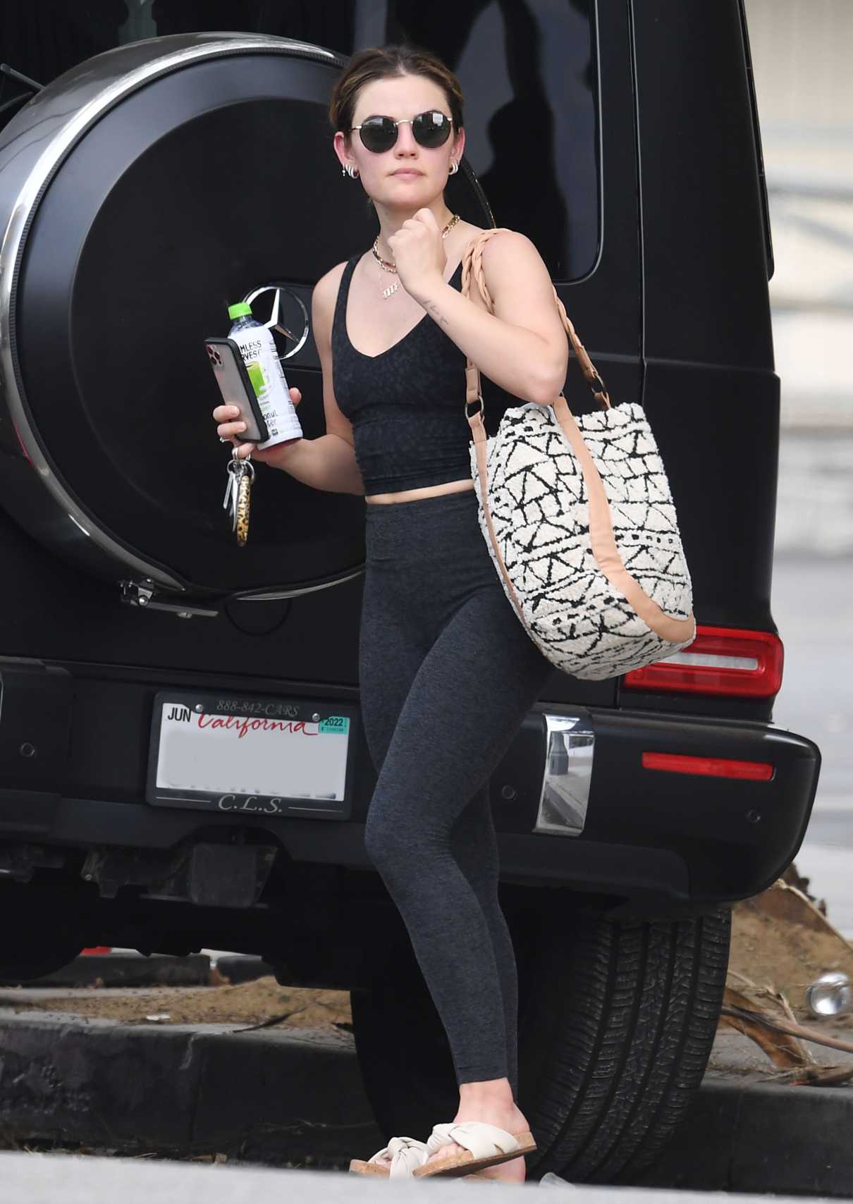 Lucy Hale in a Black Workout Ensemble Heads to a Hot Yoga Class in Los