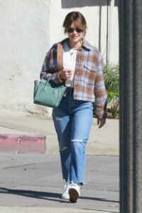 Lucy Hale in a Blue Ripped Jeans