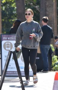 Lucy Hale in a Grey Sweatshirt