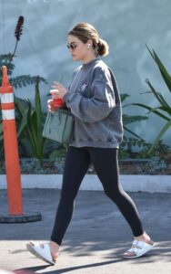 Lucy Hale in a Grey Sweatshirt