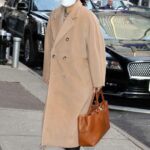 Sandra Oh in a Beige Coat Leaves the Good Morning America Show in New York 03/10/2022